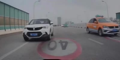 Biker Rammed From Behind in China