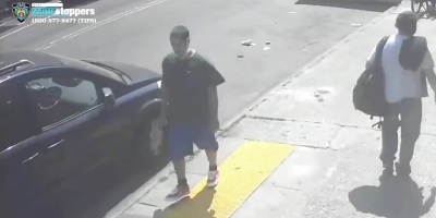 Scumbag sucker punches elderly woman