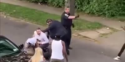 NYPD Detectives Kick Handcuffed Suspect