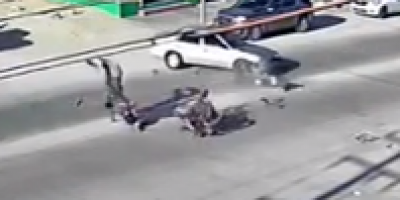 Biker Goes Flying in Hit and Run