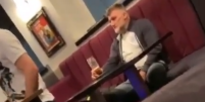 Man Enjoys His Beer In The Pub