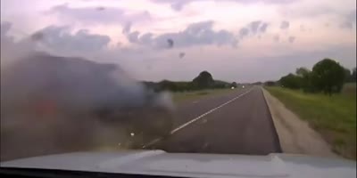Police Cruiser Hit by Car on Highway