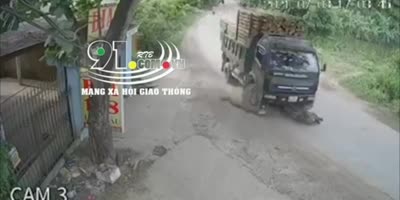 Biker Critically Injured After Sliding Under Truck