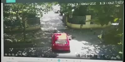 Red Car Ran Over Biker