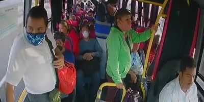 Armed robbery on bus in Mexico city.