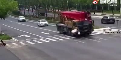 Huge Crane Truck Kills Umbrella Woman (censored)