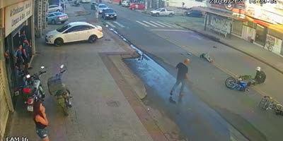 Cyclist Dropped By Biker