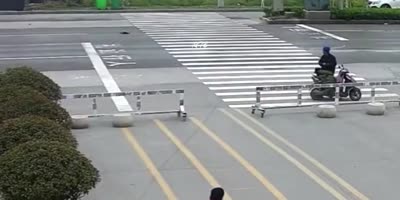 Chinese Biker Hit by Car