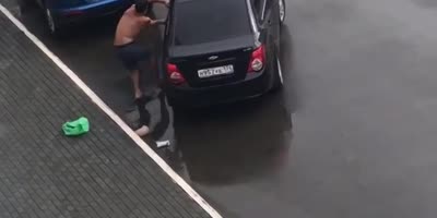 Man Attacking A Driver Gets Carried Away