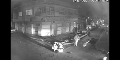 Subject goes fast down a small street and a fool does not see it coming