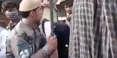 Afghani Army Soldier Beats Civilians With A Baton