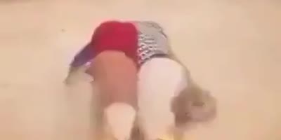 Woman breaks neck doing headstand.