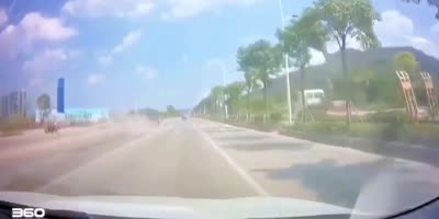 Biker Hit by Pickup Truck in China