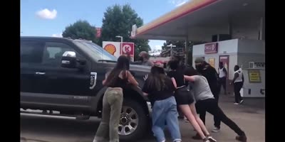 Stupid Protestors Block Guy Trying to Buy Gas