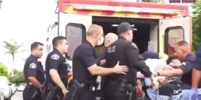 LAPD Cop Punches Wounded Suspect