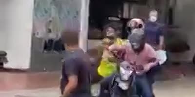 Motorcyclist collides with cyclist and they flee