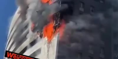 Huge fire in Milan traps residents inside.