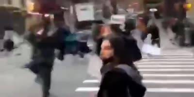 Demonstrators run over