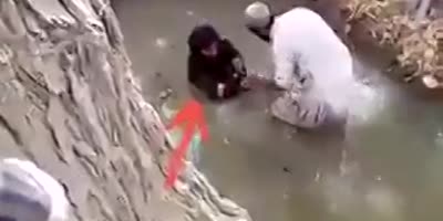 Afghani Lady Humiliated, Washed In The Sewer