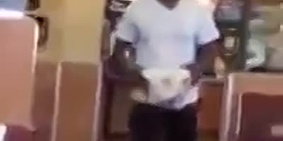 Dude Fighting For His Life In KFC