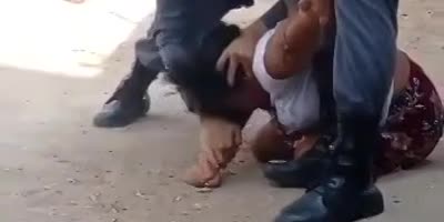 Police from my city punching a woman