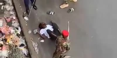 Sierra Leone Soldiers Abuse Civilian
