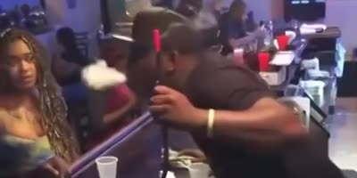 Booker T gets slammed through table