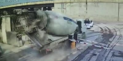 Cement Truck Flips Crushing Car Occupants In China