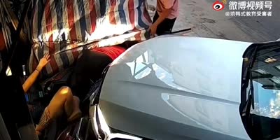 Chinese Ladies Pinned By SUV