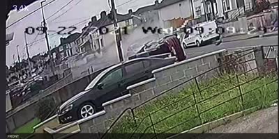 Car hits a wall and flips...