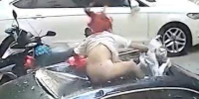 Half Naked Girl Falls On The Car