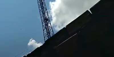 Man Leaps Off A Water Tower