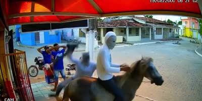 Two Armed Robbers, Rob A Grocery Store When They Arrive On Horseback (R)