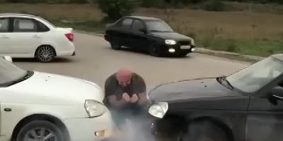 A strong man VS two cars