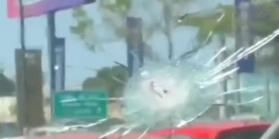 Driver Barely Avoids Bullet During Robbery In Traffic Stop In Ecuador
