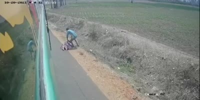 Amother Angle Of Woman Falling Of The Moving Bus In India