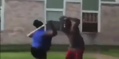 Woman with a bat starts a huge fight.