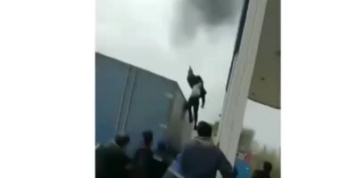 Jumping out of a buring building