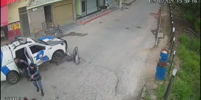 Thief hit by police car