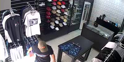 Clothes Store Owner Shoots Robbers (R)