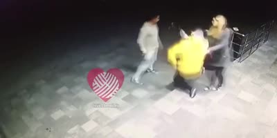 Cop beats yellow jacket guy