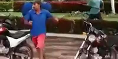 Guy Getting Hit With A Giant Stick