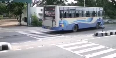 Bus hits motorcyclist making a u-turn