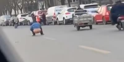 Chinese Man Shits In Public