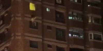 Woman Falls Off Tall Building In China