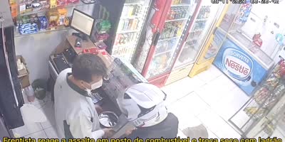 Gas Station Robber Meets Machete