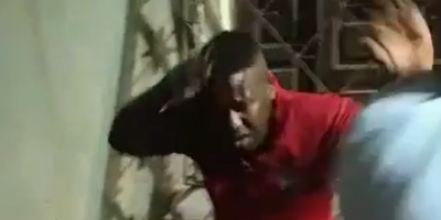 Thief In Red Shirt Planked In Slums