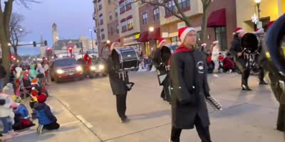SUV plows in band people