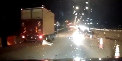 Female Driver Causes Close Call In Malasia