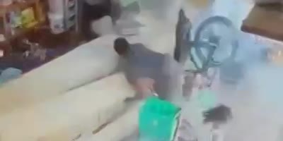 Out-of-control biker hits the market